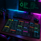 Linux Tux desk mat in a cyan and magenta developer workspace